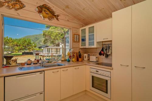 Absolute Beachfront Bach - Pauanui Holiday Home