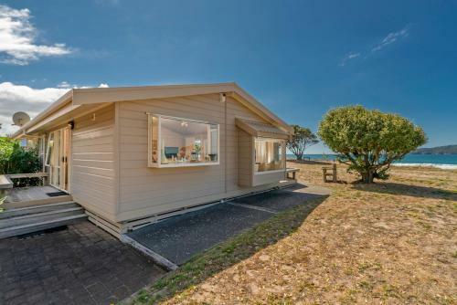 Absolute Beachfront Bach - Pauanui Holiday Home