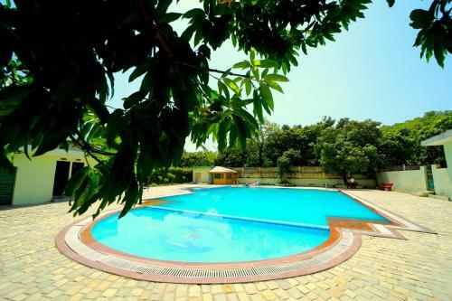 Hotel Anand Aamod Spa And Resort-riverside Resort