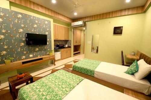 Apartamento Gems Suites