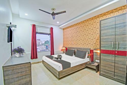 Capital O 91036 Hotel Stanza