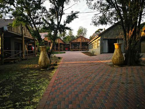The Log Cabin Apartments Hotel