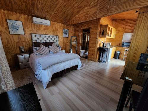 The Log Cabin Apartments Hotel