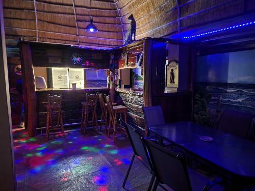 The Log Cabin Apartments Hotel