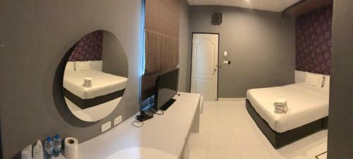 Apartamento Theliving Surat