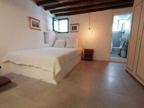 Traditional House In A Settlement In Paros
