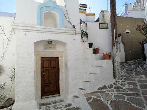 Traditional House In A Settlement In Paros