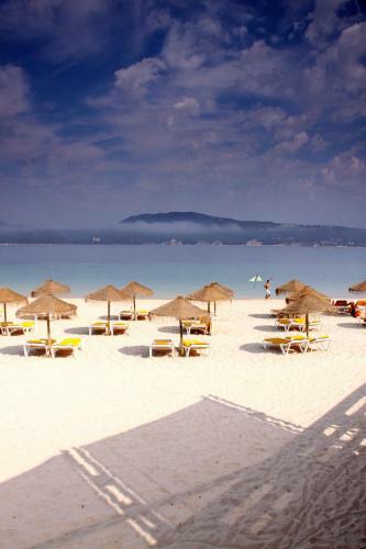 Tr�ia F�rias Na Praia