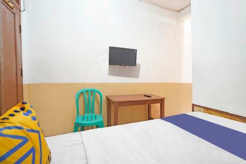 Spot On 91444 Hotel Arimbi