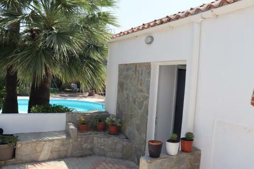 Apartamento Mediterranean Poolside Garden Cottage