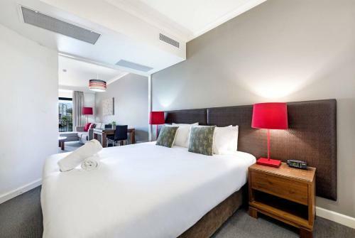 Apartamento Breezy Harbourside Getaway - Balcony & Resort Pool