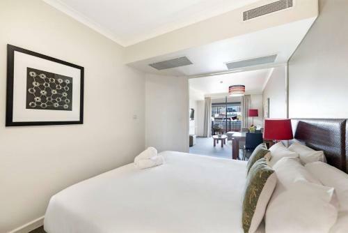 Apartamento Breezy Harbourside Getaway - Balcony & Resort Pool
