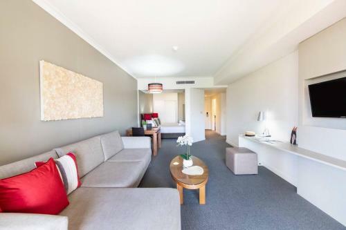 Apartamento Breezy Harbourside Getaway - Balcony & Resort Pool