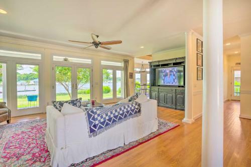 Elegant Waterfront Home With Bar, Deck And Views!