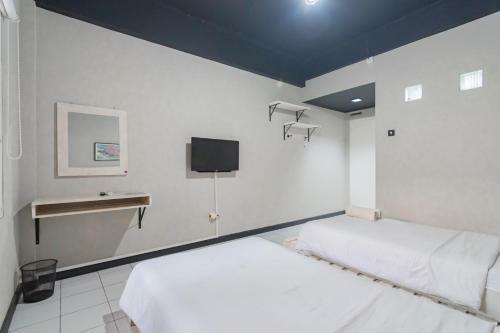 Bed & Breakfast Reddoorz At Home 33 Bandung