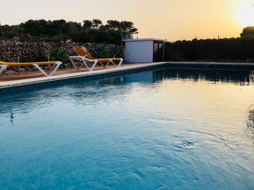 Casa Con Piscina Compartida En Addaia