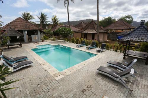 Collection O 1651 Purnama Beach Hotel