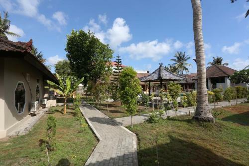 Collection O 1651 Purnama Beach Hotel