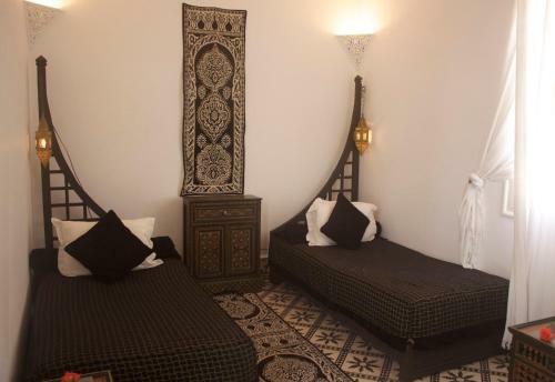 Riad Mala�ka