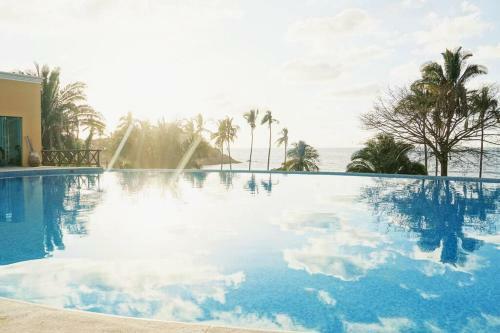 Apartamento Lovely 3 Bedroom With Infinity Pool/private Beach