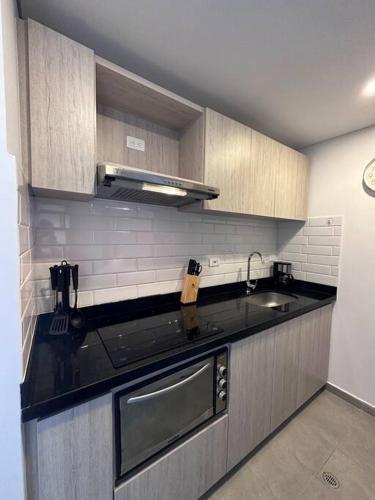 Apartamento Moderno En El Centro Con Vista A La Ciudad