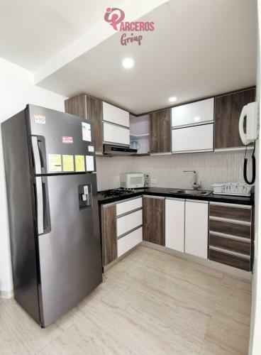 C�modo Apartamento Cerca A La Playa Por Parceros Group
