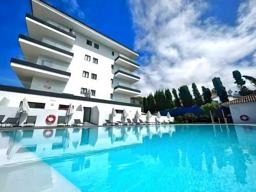 Apartamento Modern Oasis - Pool, Gym & Tennis