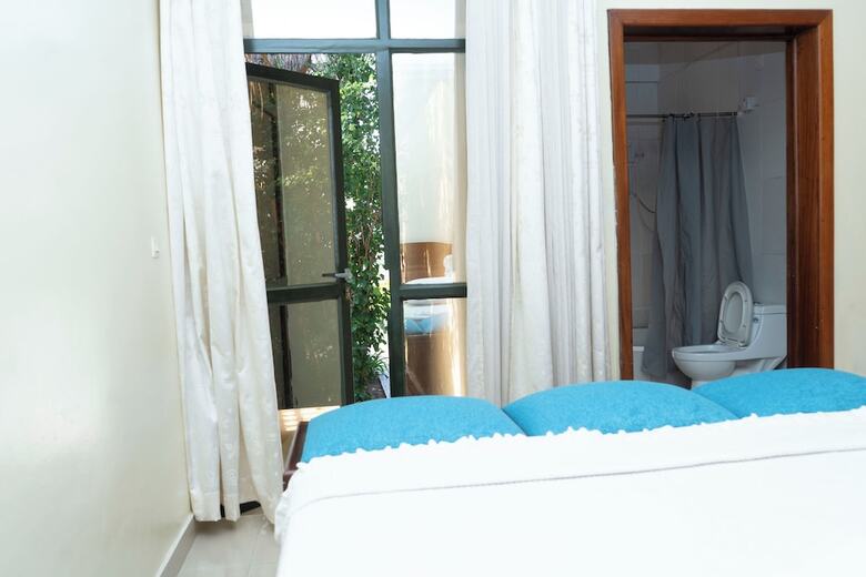 Aparthotel Nyumbani Downtown Cottages