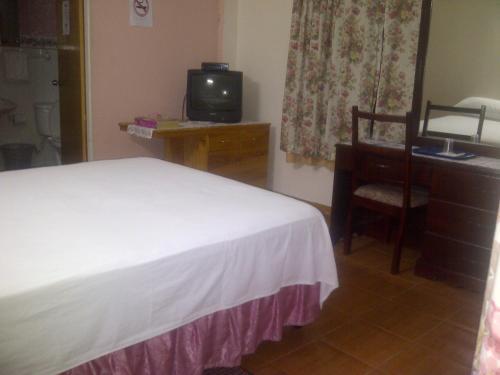 Hostal Palm Bay Guest House & Restaurant