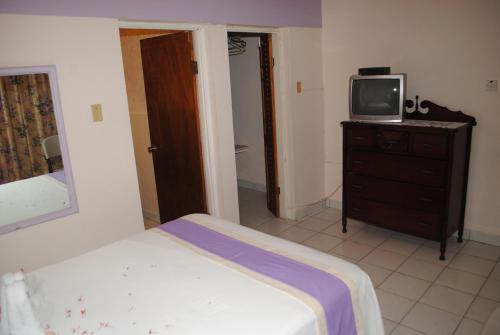 Hostal Palm Bay Guest House & Restaurant