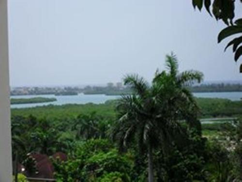 Hostal Palm Bay Guest House & Restaurant