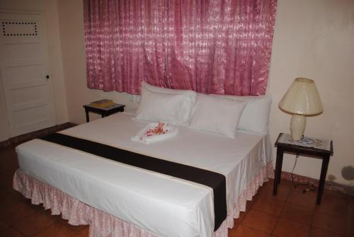 Hostal Palm Bay Guest House & Restaurant