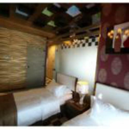 Apartamento Roomi Suites Hotel