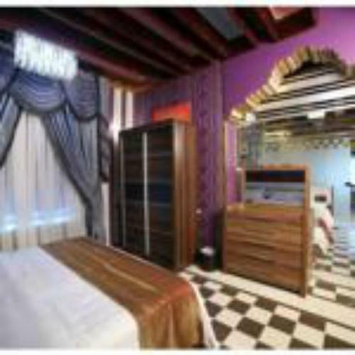 Apartamento Roomi Suites Hotel