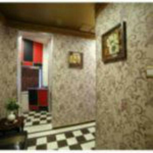 Apartamento Roomi Suites Hotel