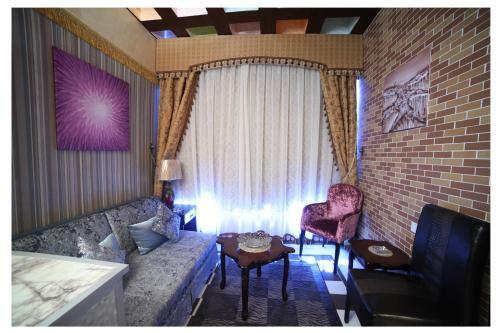 Apartamento Roomi Suites Hotel