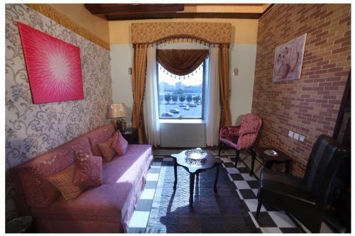 Apartamento Roomi Suites Hotel