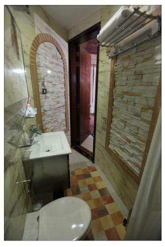 Apartamento Roomi Suites Hotel