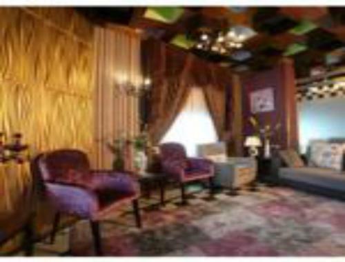 Apartamento Roomi Suites Hotel
