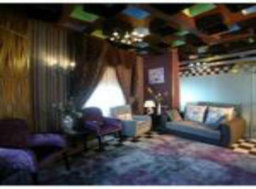 Apartamento Roomi Suites Hotel