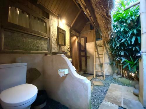 Flower Bud Bungalow Balangan