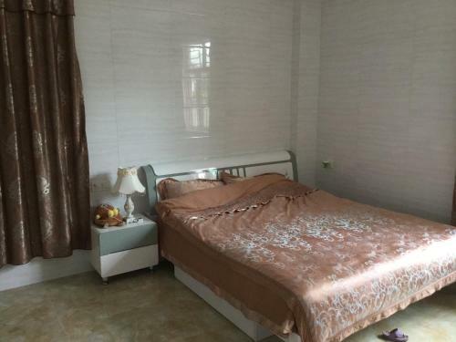 Apartamento Shuangyuewan Happy Inn