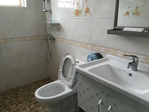Apartamento Shuangyuewan Happy Inn