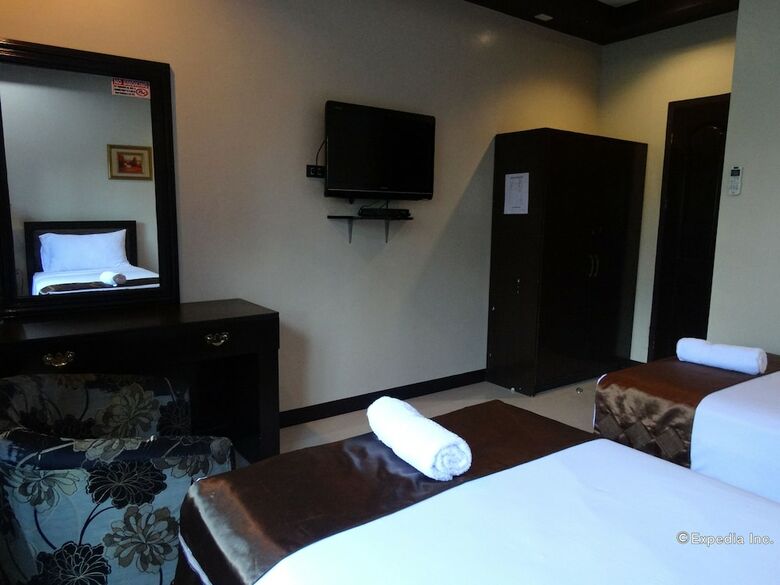 Hotel The Peridot Suites