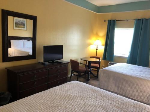 Hotel Deluxe 6 Inn & Suites