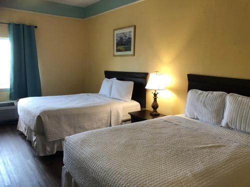 Hotel Deluxe 6 Inn & Suites