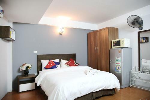Apartamentos New Land House 8