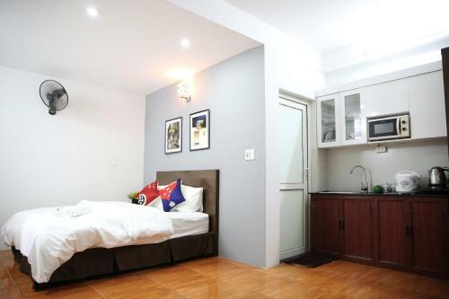 Apartamentos New Land House 8