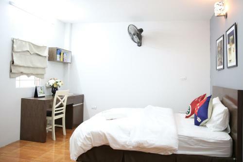Apartamentos New Land House 8