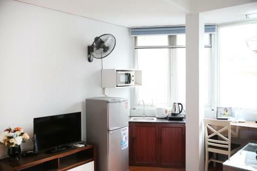 Apartamentos New Land House 8